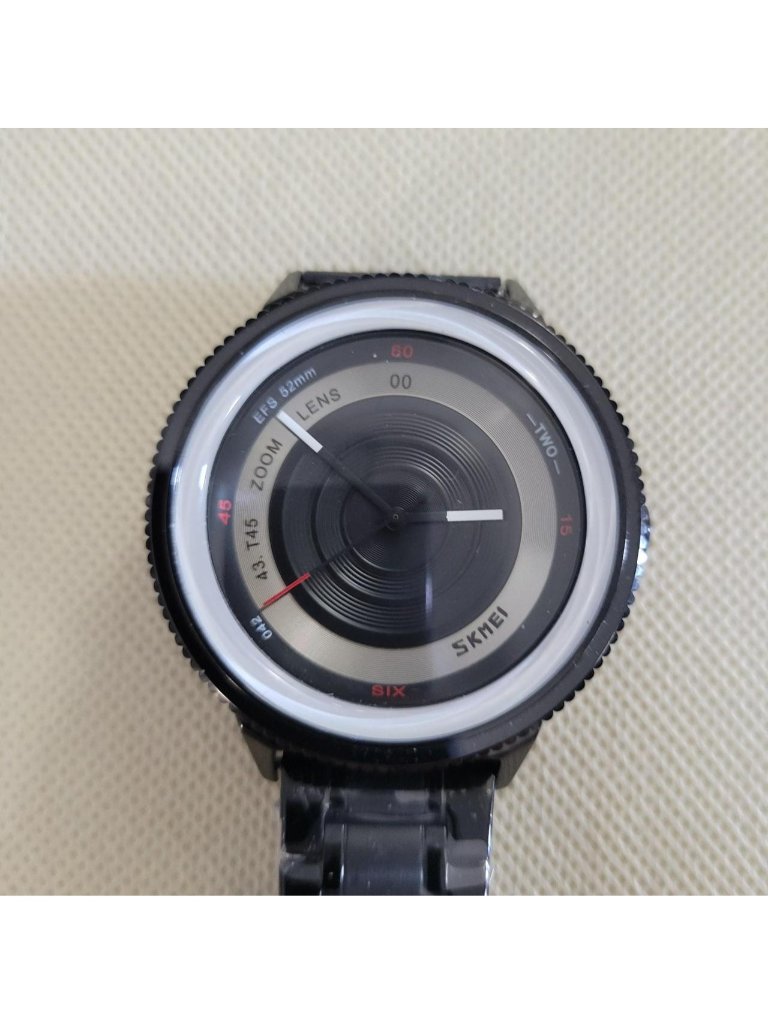 Skmei Mens Black Bezel Band Watch That Has A Telephoto Lens Dial With 44mm Bezel Skmei Mens Black Bezel Band Watch That Has A Telephoto Lens Dial With 44mm Bezel